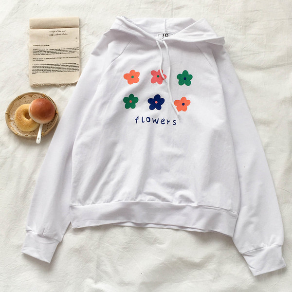 Γυναικεία μπλούζα σε λευκό και μαύρο χρώμα  με κορδόνια και κουκούλα