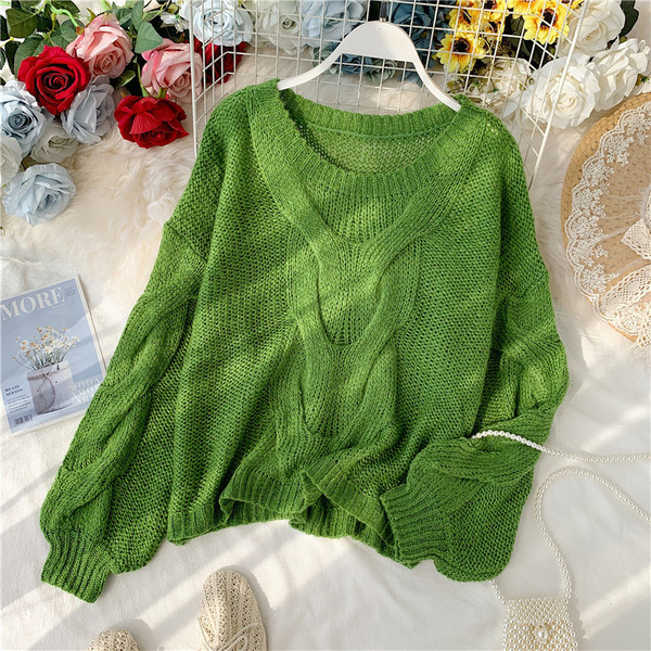 Női pulóver - széles modell és O-nyakú