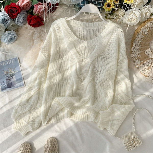 Női pulóver - széles modell és O-nyakú