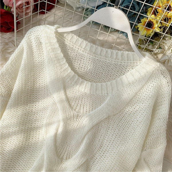 Női pulóver - széles modell és O-nyakú