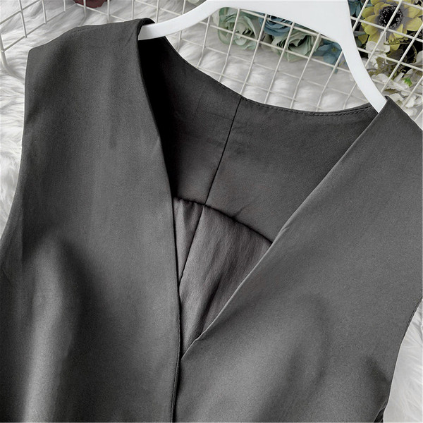 Γυναικείο  γιλέκο με ζ΄ώνη στη  μέση σε μαύρο χρώμα