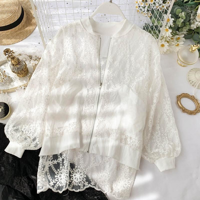 Γυναικείο σακάκι  με τσέπες σε μαύρο και άσπρο χρώμα