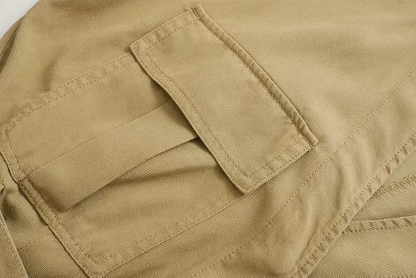 Μοντέρνα γυναικεία ολόσωμη φόρμα  σε καφέ χρώμα με ζώνη και τσέπες