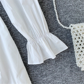 Γυναικείο φόρεμα με μακριά μανίκια και κουμπιά σε μαύρο και άσπρο χρώμα