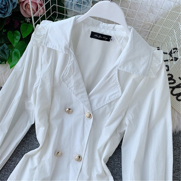 Γυναικείο φόρεμα με μακριά μανίκια και κουμπιά σε μαύρο και άσπρο χρώμα