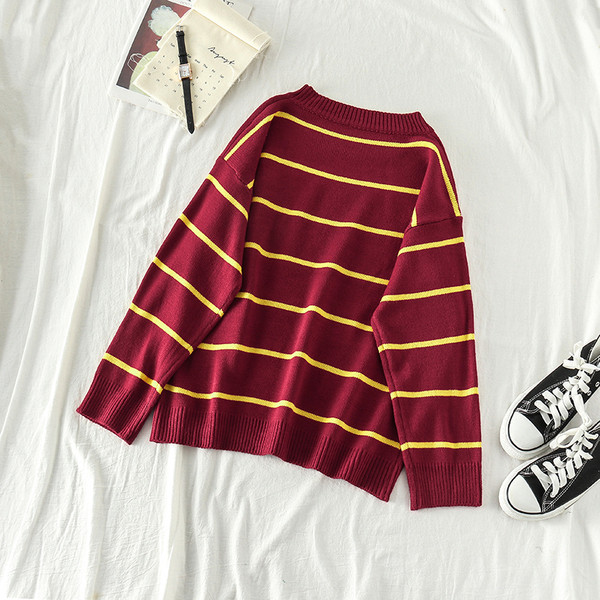 Πουλόβερ γυναικείο ριγέ σε μαύρο και μπορντό χρώμα