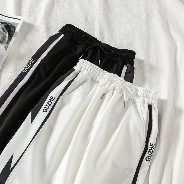 Pantaloni casual dama cu elastic in alb si negru