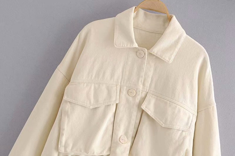 Ασύμμετρό γυναικείο σακάκι άνοιξη-φθινόπωρο με τσέπες και κουμπιά σε λευκό χρώμα