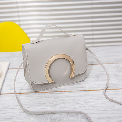 Modern női táska fém elemmel több színben