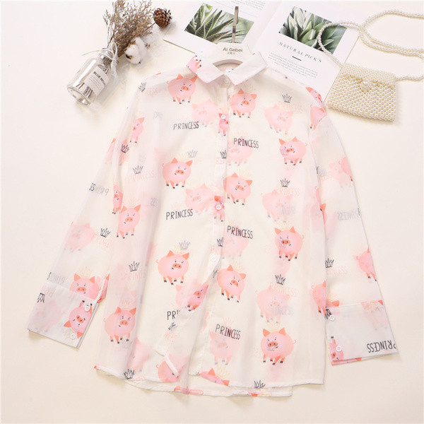 Κορυφές γυναικείο πουκάμισο σε λευκό και μαύρο με εφαρμογές