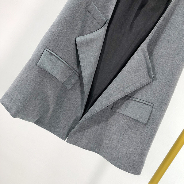 Γυναικείο κομψό  γιλέκο με τσέπες σε γκι χρώμα