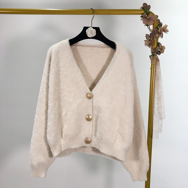 Rövid női mellény gombokkal és spitz nyakkivágással, két színben