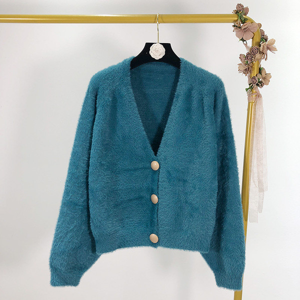 Rövid női mellény gombokkal és spitz nyakkivágással, két színben