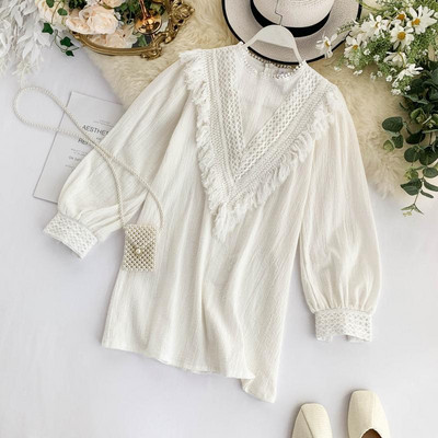 Κομψή γυναικεία μπλούζα μοντέλο σε λευκό και μαύρο χρώμα