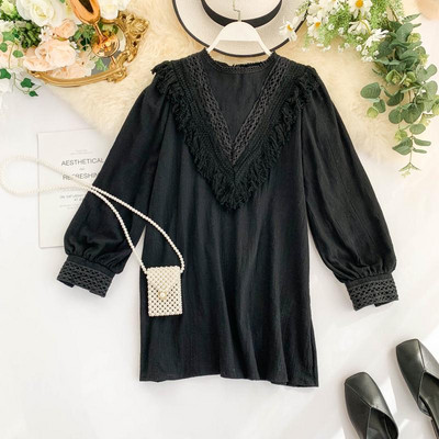 Κομψή γυναικεία μπλούζα μοντέλο σε λευκό και μαύρο χρώμα