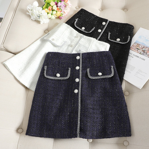 Stílusos női szoknya gombokkal, három színben