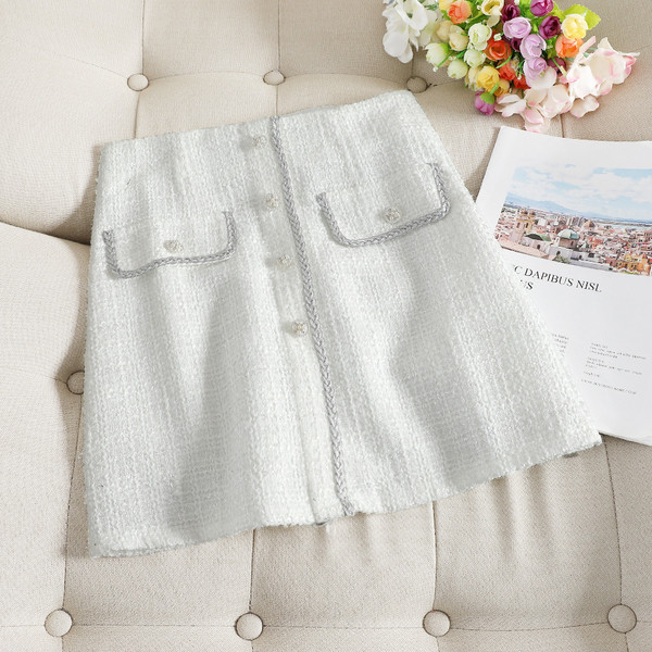 Stílusos női szoknya gombokkal, három színben