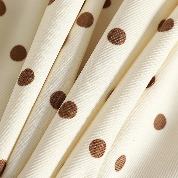 Pöttyös női ruha hosszú ujjú fekete-fehér színben