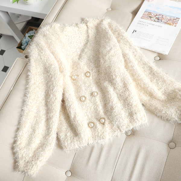 Vestă de puf de damă cu decolteu în V și nasturi în două culori