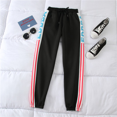 Καθημερινό γυναικείο παντελόνι  σε μαύρο και άσπρο χρώμα  με επιγραφή