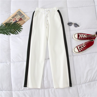 Alkalmi női nadrág fehér és fekete színben, szegéllyel