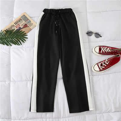 Alkalmi női nadrág fehér és fekete színben, szegéllyel