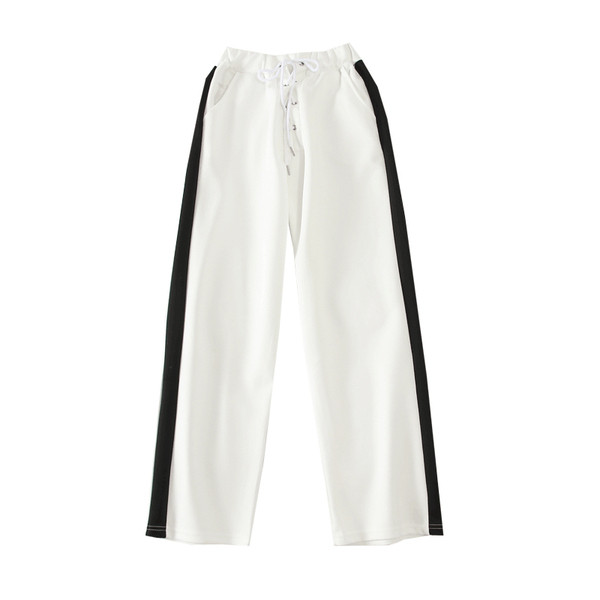 Alkalmi női nadrág fehér és fekete színben, szegéllyel