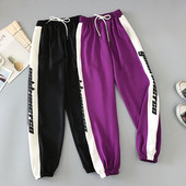 Női nadrág két színben felirattal és nyakkendővel