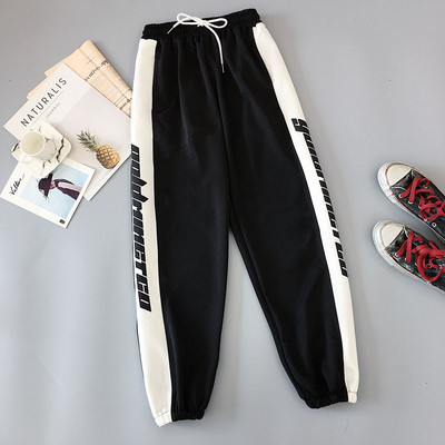 Női nadrág két színben felirattal és nyakkendővel