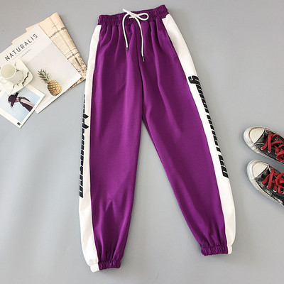 Női nadrág két színben felirattal és nyakkendővel