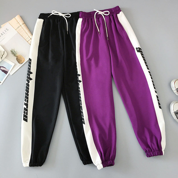 Női nadrág két színben felirattal és nyakkendővel