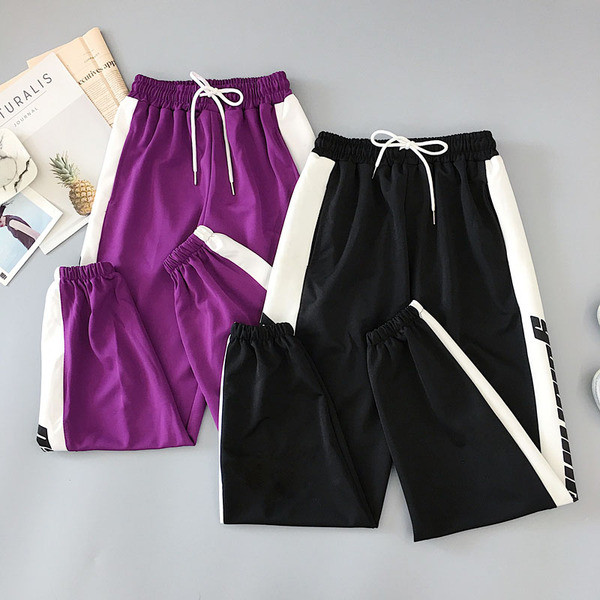 Női nadrág két színben felirattal és nyakkendővel