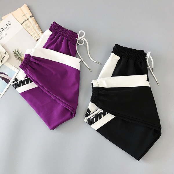 Női nadrág két színben felirattal és nyakkendővel