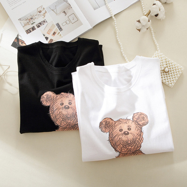 Casual γυναικεία μπλούζα σε μαύρο και άσπρο χρώμα  με εφαρμογή