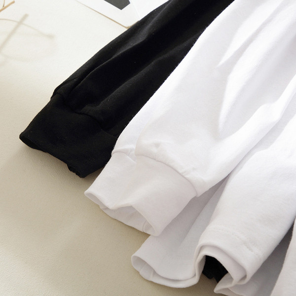 Casual γυναικεία μπλούζα σε μαύρο και άσπρο χρώμα  με εφαρμογή