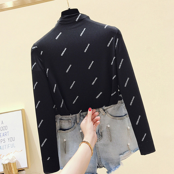 Καθημερινή  γυναικεία μπλούζα με μακριά μανίκια σε λευκό και μαύρο χρώμα