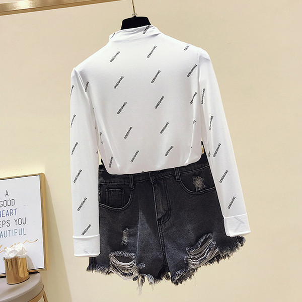 Καθημερινή  γυναικεία μπλούζα με μακριά μανίκια σε λευκό και μαύρο χρώμα