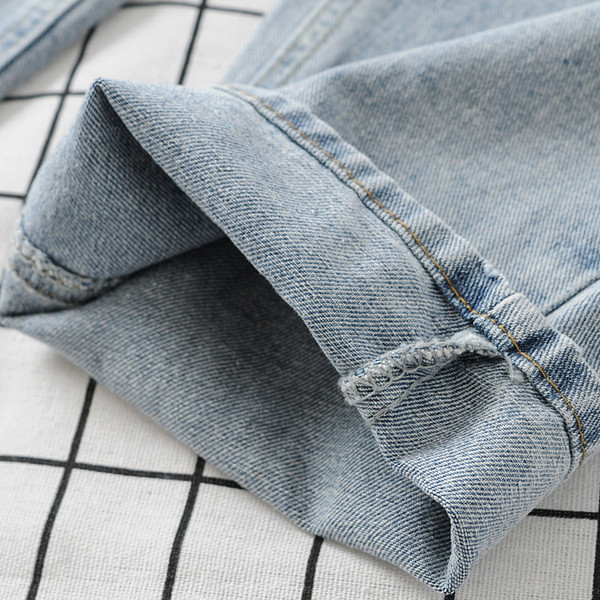 Модерни дамски дънки с разкъсани мотиви и размери до  4XL