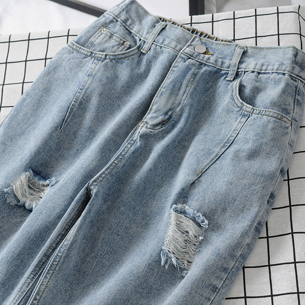 Модерни дамски дънки с разкъсани мотиви и размери до  4XL