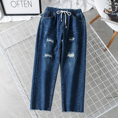 Ежедневни дамски дънки с разкъсани мотиви и връзки в син цвят