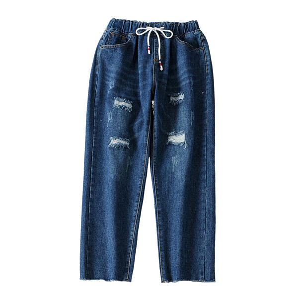 Ежедневни дамски дънки с разкъсани мотиви и връзки в син цвят 