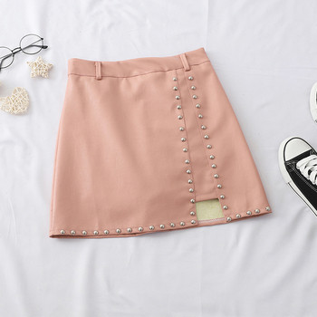 Актуална дамска пола от еко кожа с метални елементи в няколко цвята