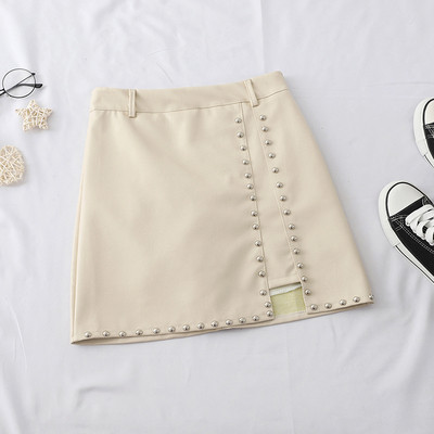 Актуална дамска пола от еко кожа с метални елементи в няколко цвята