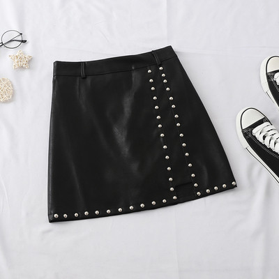 Актуална дамска пола от еко кожа с метални елементи в няколко цвята