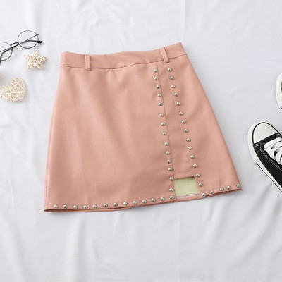 Актуална дамска пола от еко кожа с метални елементи в няколко цвята