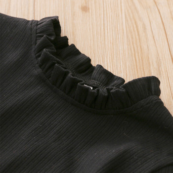 Модерна детска блуза с висока яка в черен и бял цвят