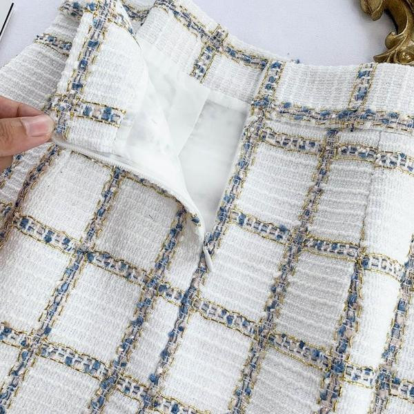 Модерна дамска пола в бял и черен цвят с висока талия и цип