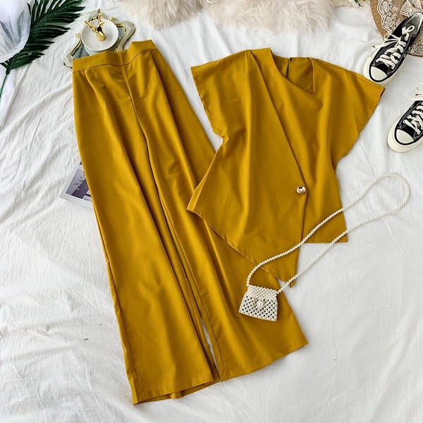 Стилен дамски комплект включващ блуза и широк панталон в четири цвята 