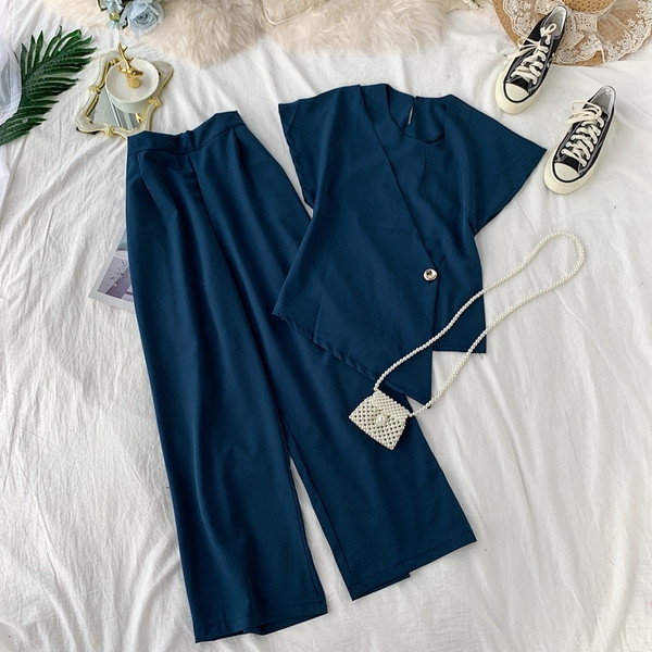 Стилен дамски комплект включващ блуза и широк панталон в четири цвята 