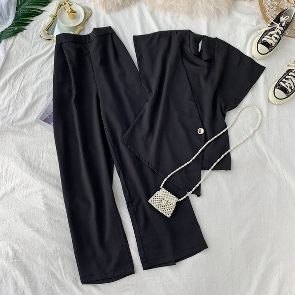 Стилен дамски комплект включващ блуза и широк панталон в четири цвята 